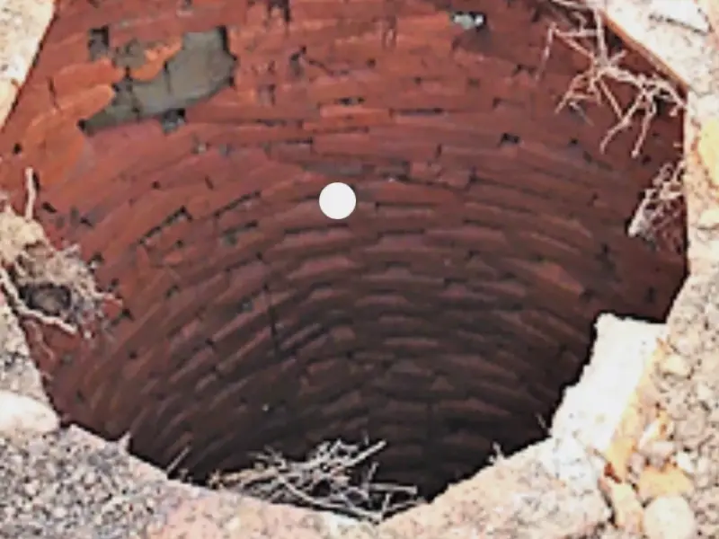 An old brick-lined cesspool, opened for service