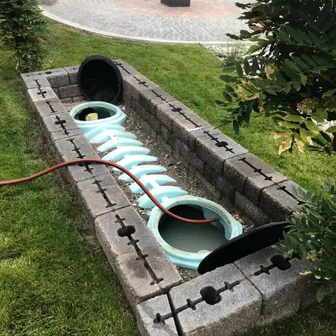 Tank risers exposed during an inspection