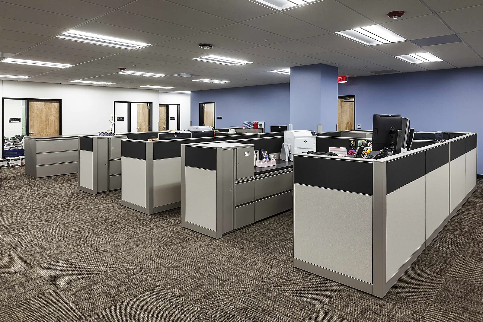 Finished open office with workstations, built by Valenti Construction